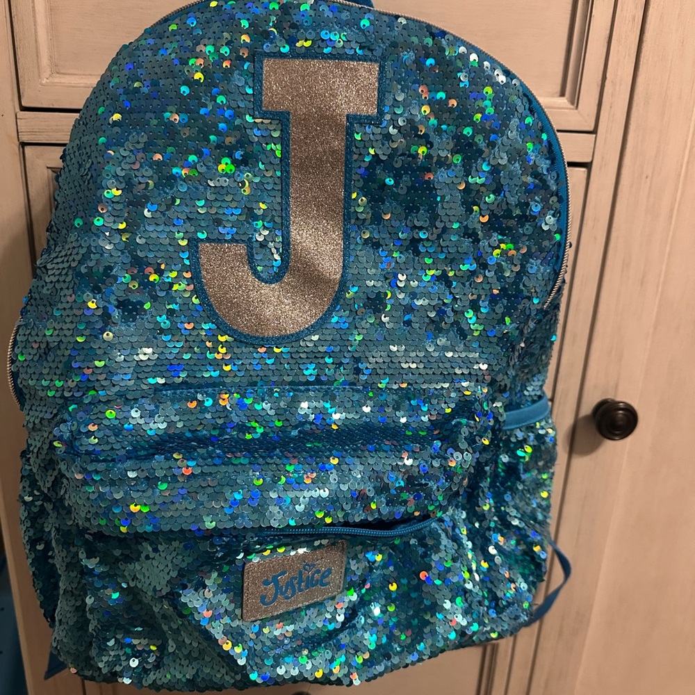 Blue Sequin Backpack initial J 
Justice -brand 
Like-new. Gently used
